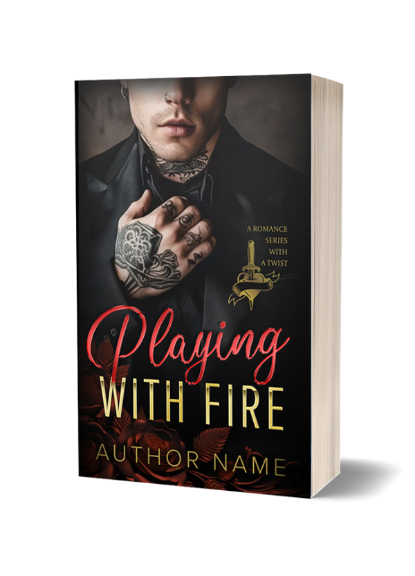 Details: Playing with Fire: Premade Book Cover. The cropped face of a handsome young man wearing a black satin suit. His neck is tattooed, as is his hand. He has an ear ring and a nosering. The title uses a script font and a sans serif font. The script font is red shiny, satin, and the sans serif is gold. There is a golden badge icon of a heart and dagger. The background is black. Suitable for Romance (mafia, age-gap, enemies to lovers)